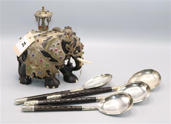 Sri Lankan mounted ebony model elephant and four similar spoons